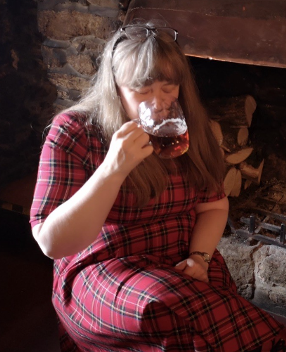 Woman drinking beer before weight loss
