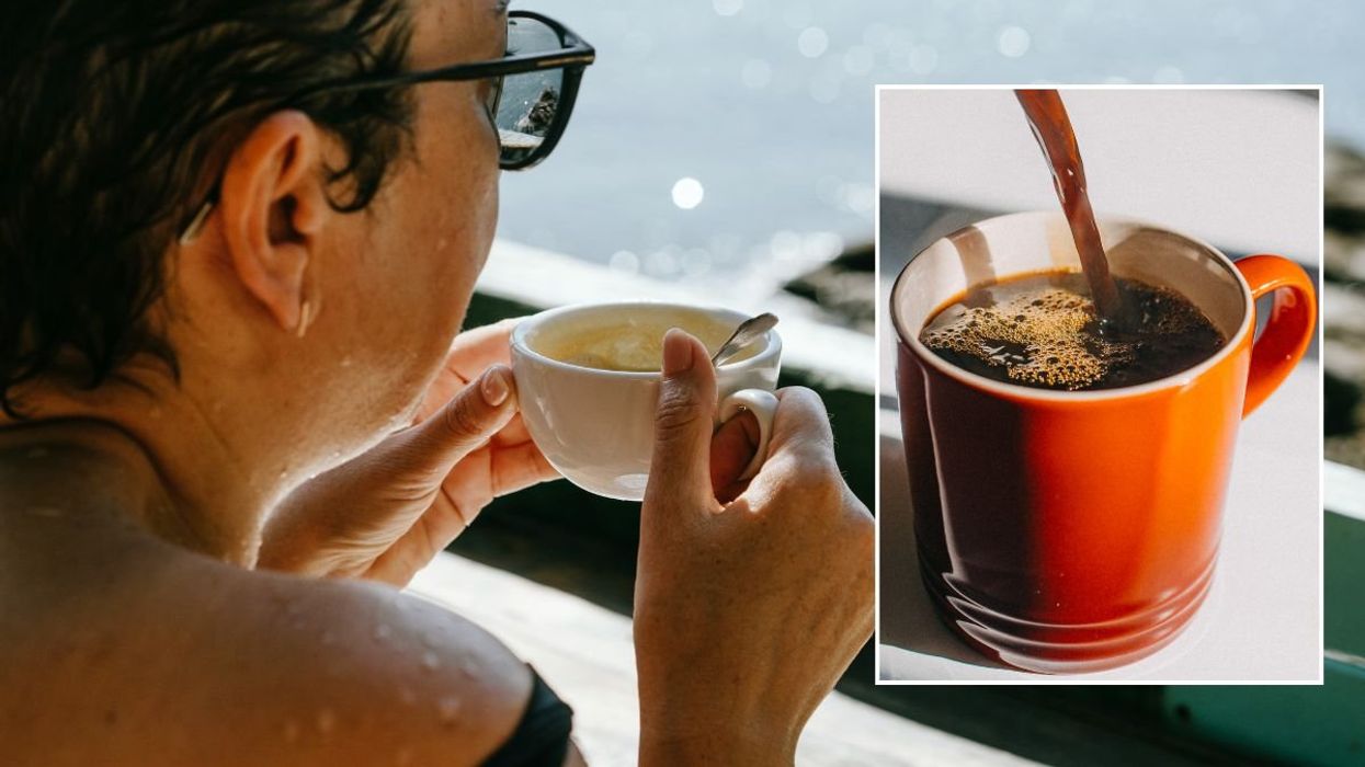 WOMAN DRINKING COFFEE