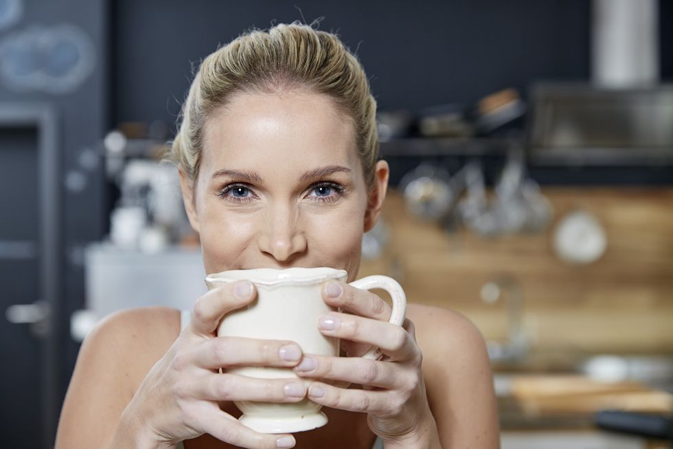 Woman drinking from a mug