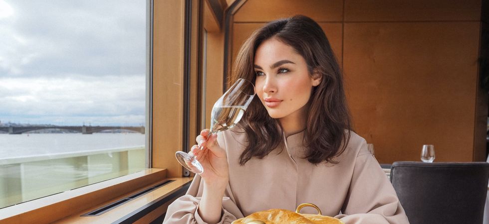 Woman drinking on cruise ship