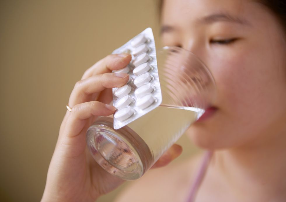 WOMAN DRINKING WATER
