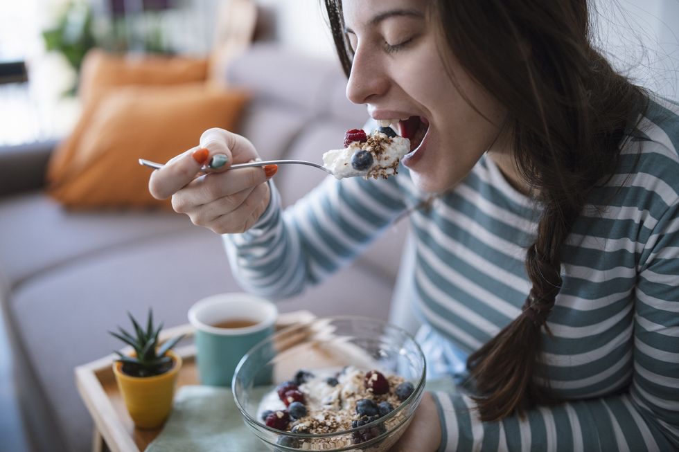 Woman eating a healthy breakfast