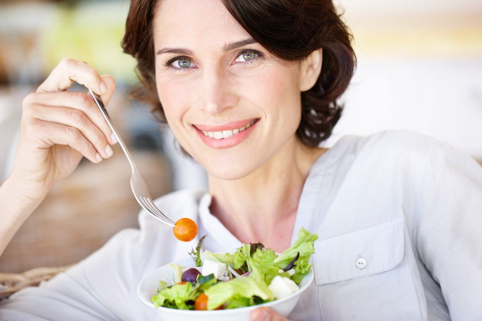 Woman eating a salad