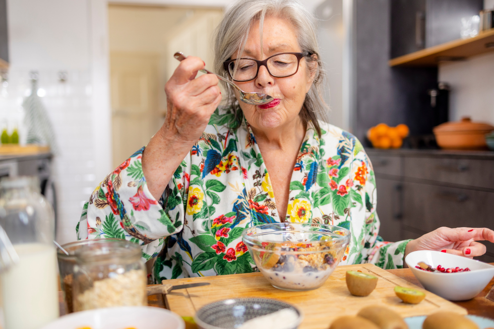 Woman eating breakfast
