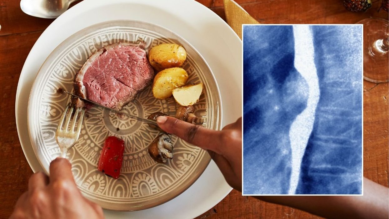 WOMAN EATING MEAT
