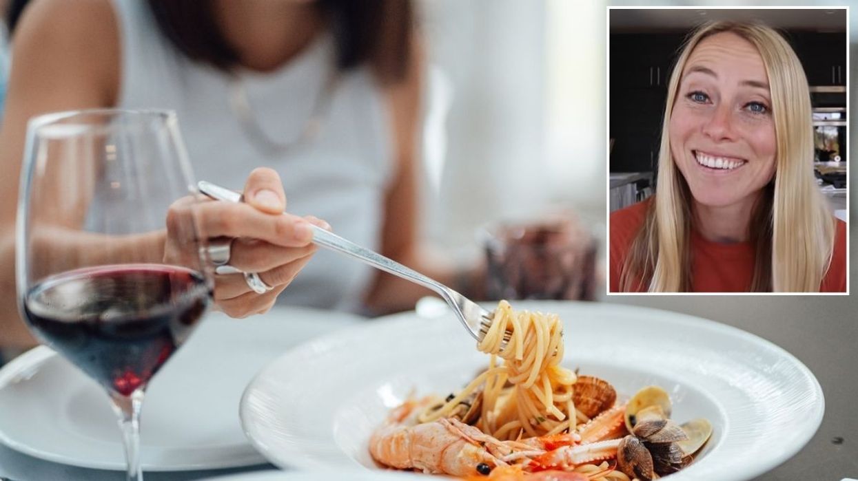 Woman eating pasta / Autumn Bates