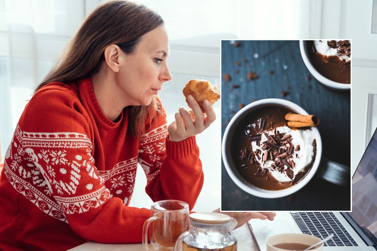 woman eating pastry and hot chocolate stock image