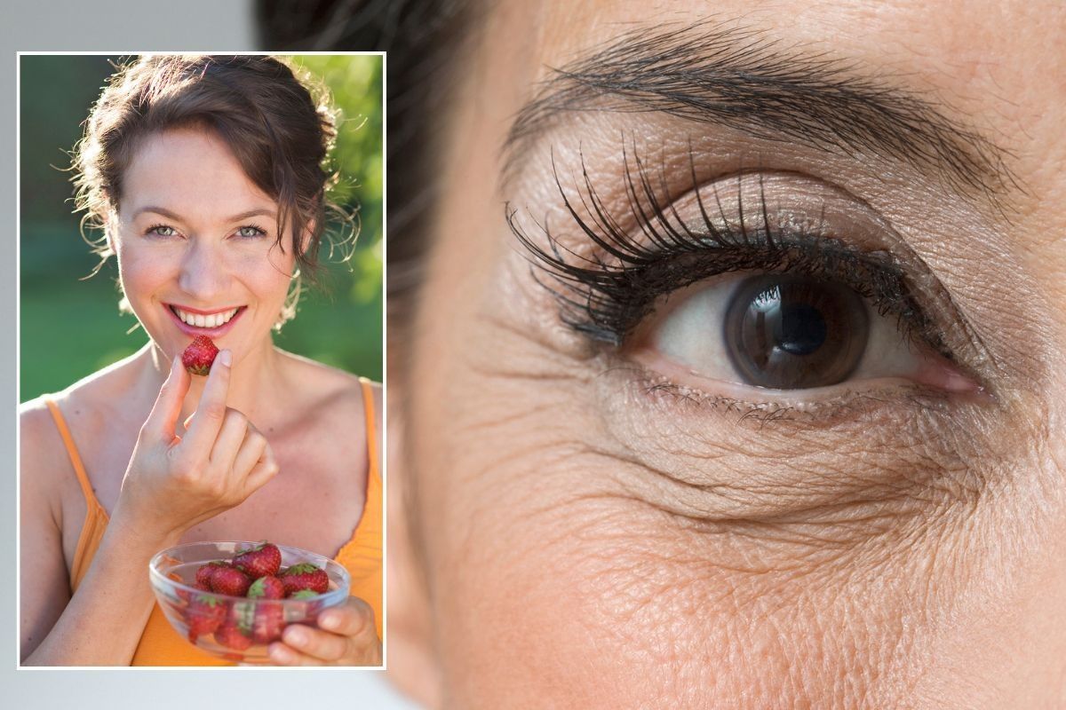 Woman eating strawberries / Close-up under-eye area
