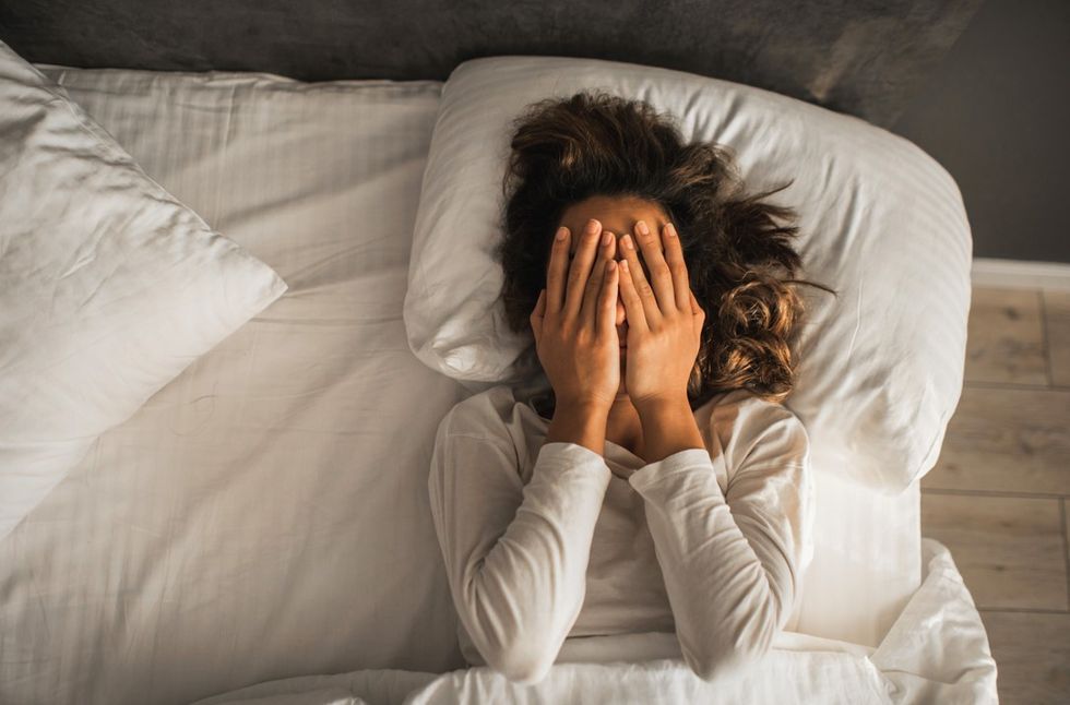 woman experiencing sleep troubles