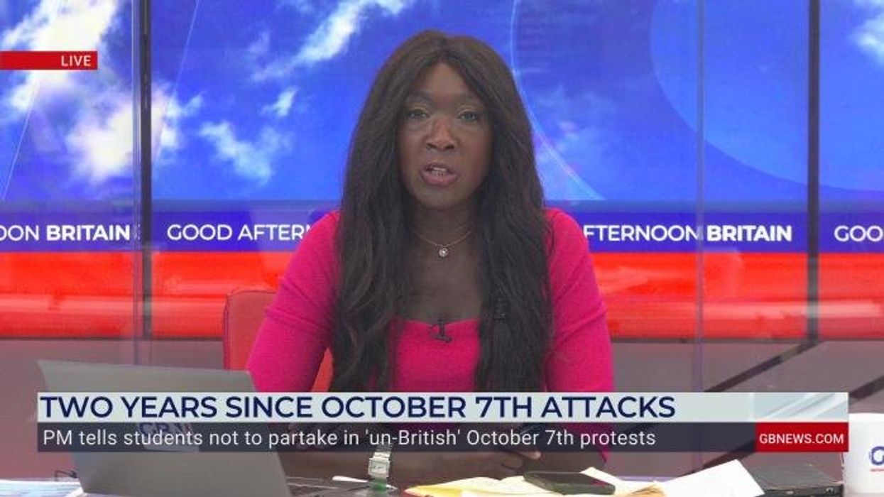 Woman filmed cutting down October 7 memorial ribbons as she's reported to police for 'disgusting' act