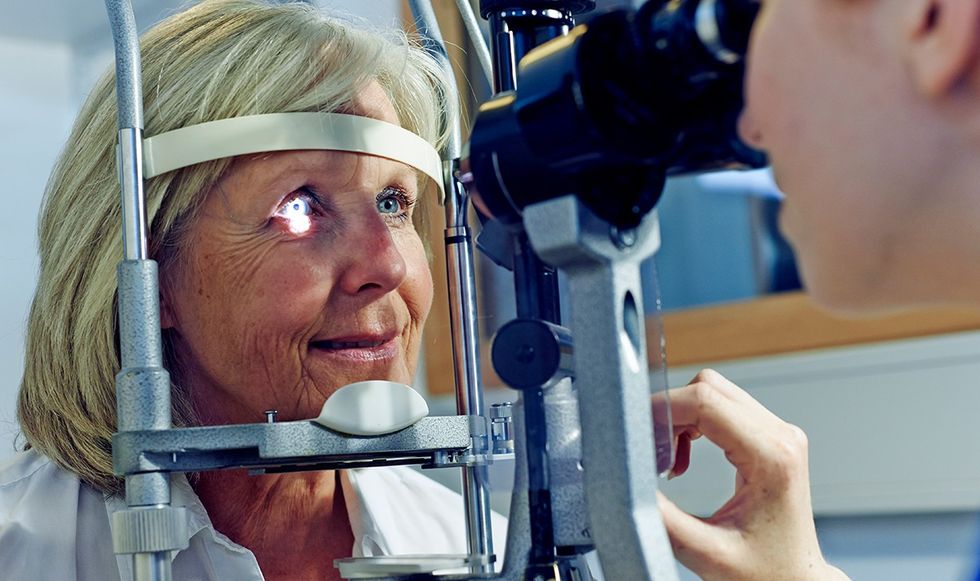 Woman getting eye examined