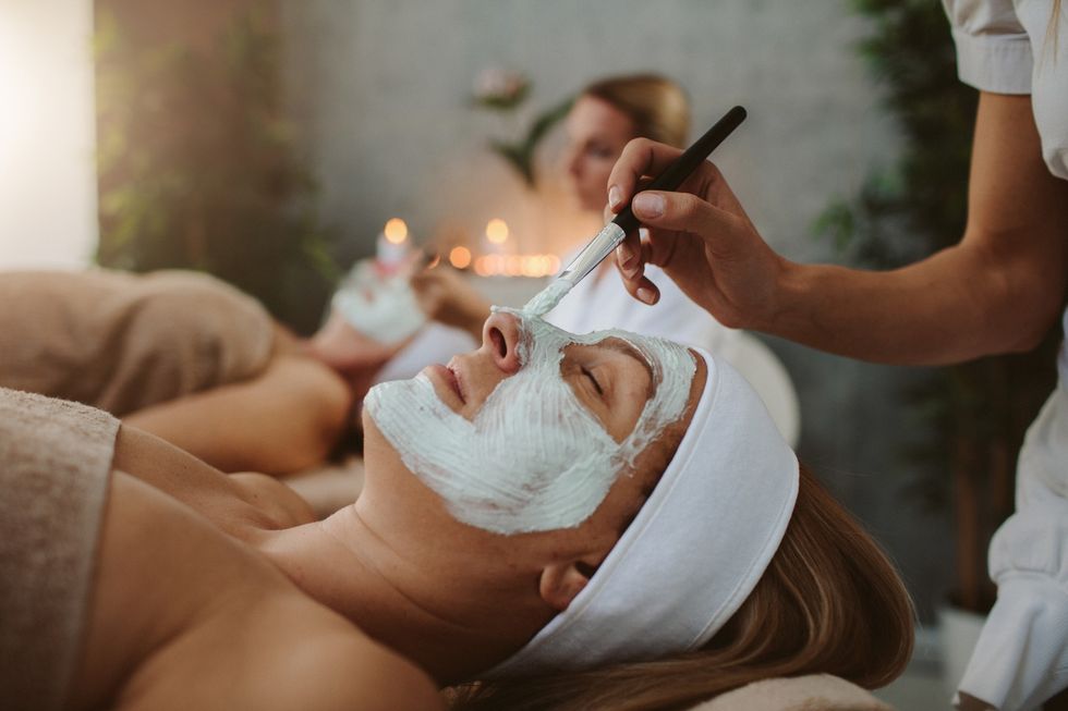 Woman having a facial in spa