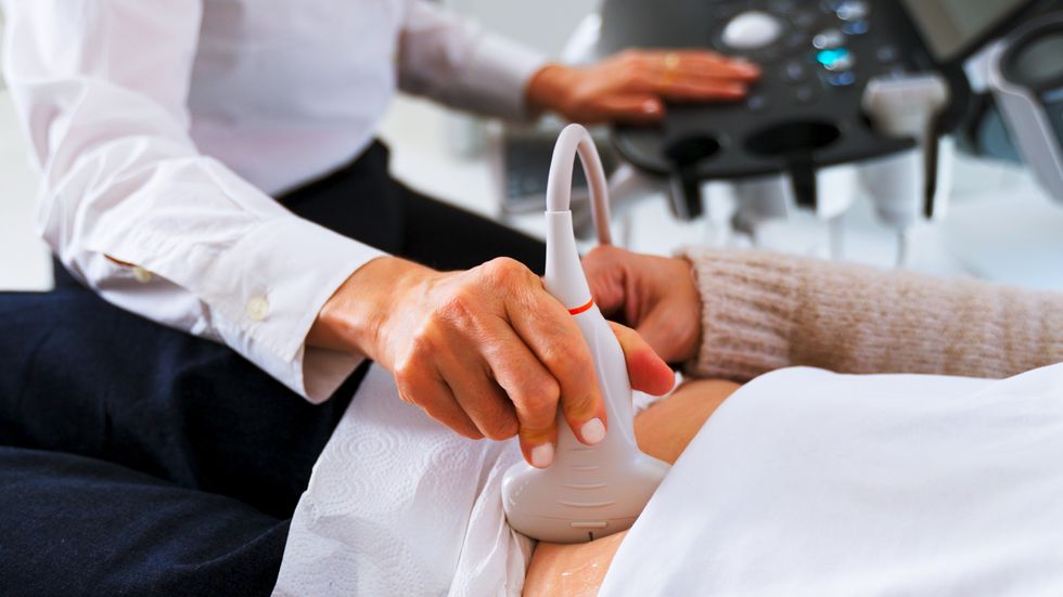 WOMAN HAVING OVARY SCAN