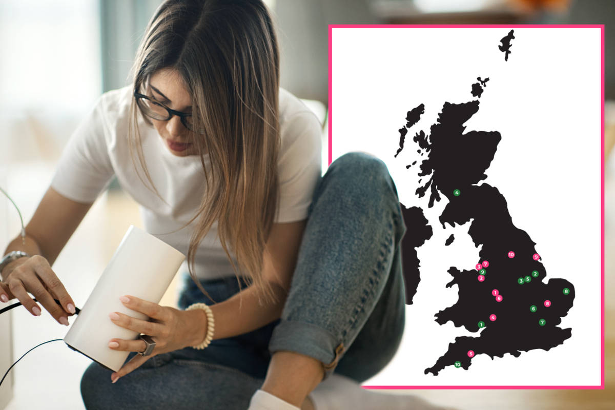 woman holding a Wi-Fi router with a map of the UK