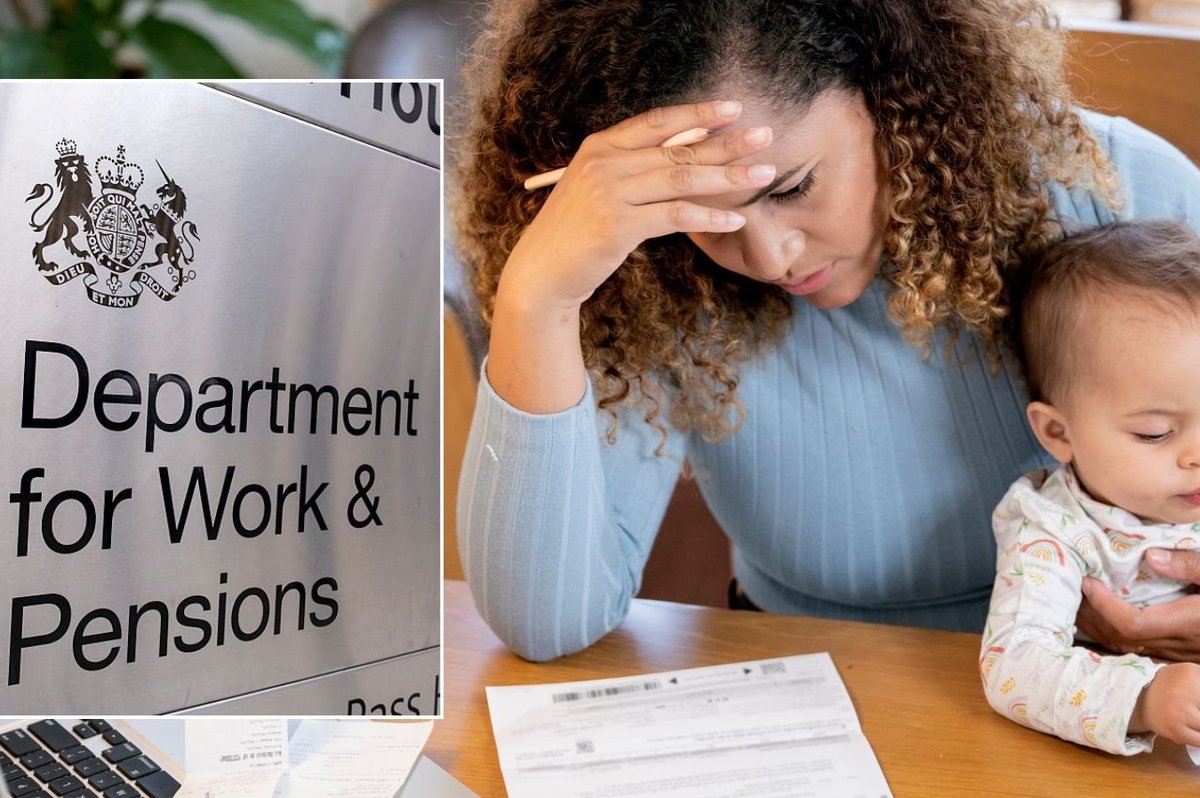 Woman holding baby and DWP sign