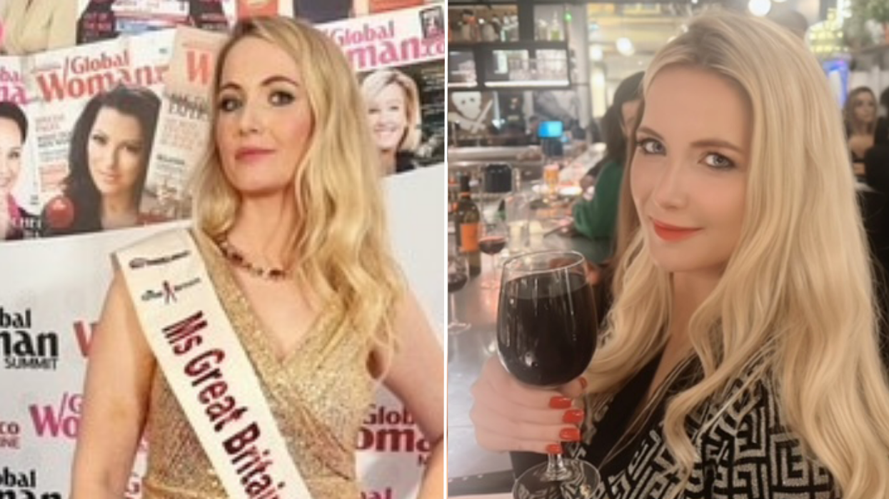 Woman holding glass of wine