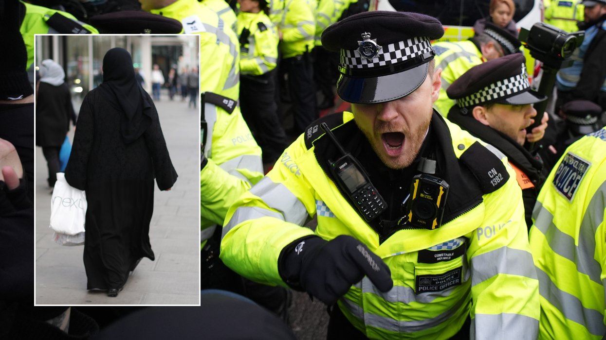 Woman in Islamic dress/Police