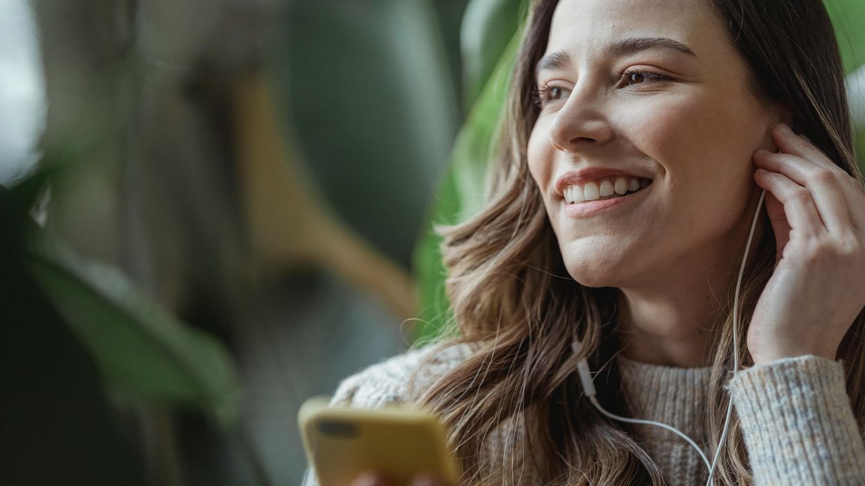 Woman listening to playlist