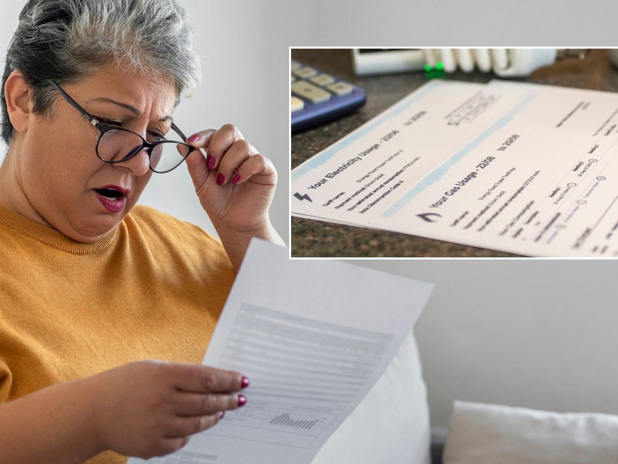 Woman looking at bill and energy bill