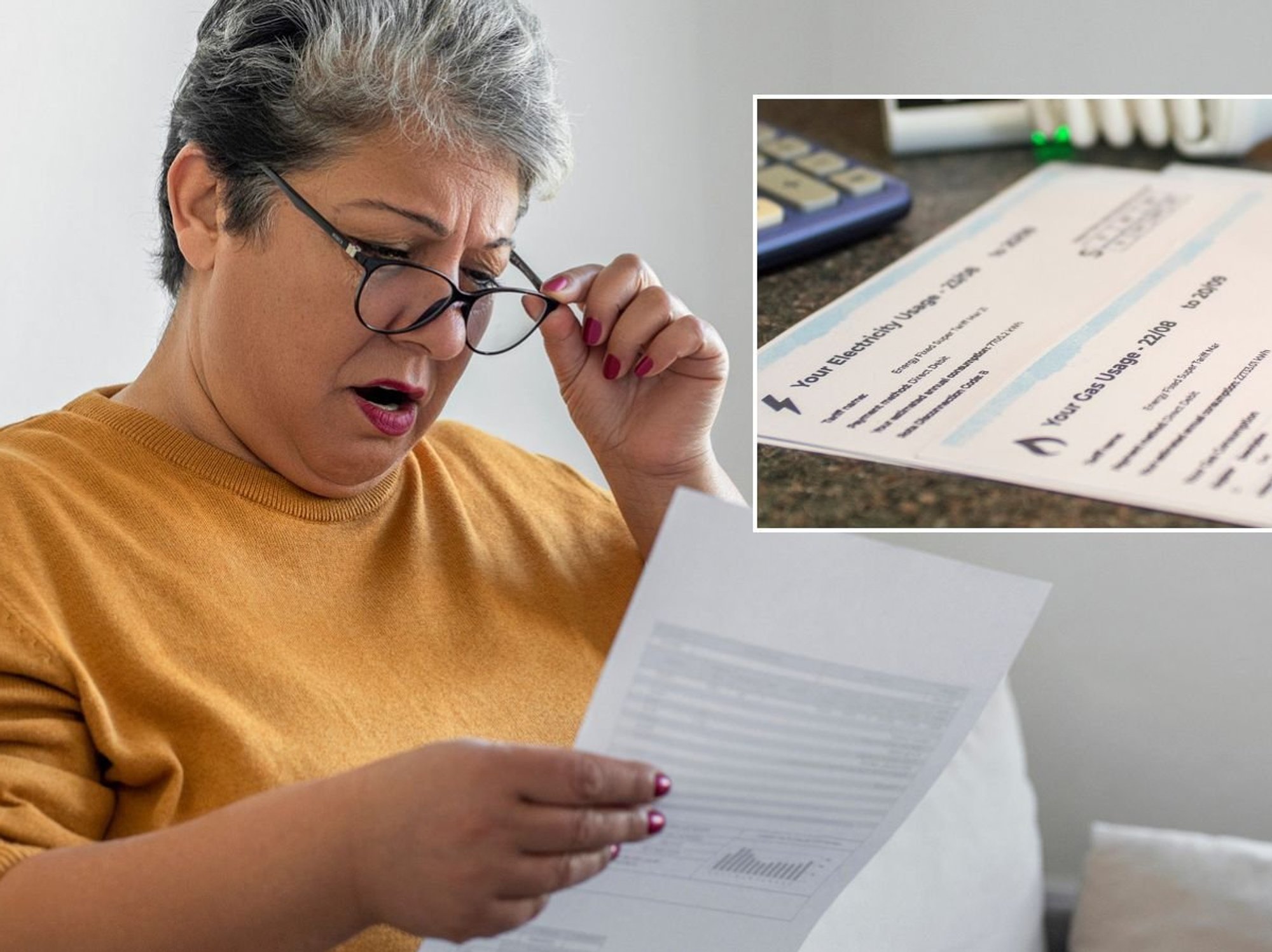 Woman looking at bill and energy bill