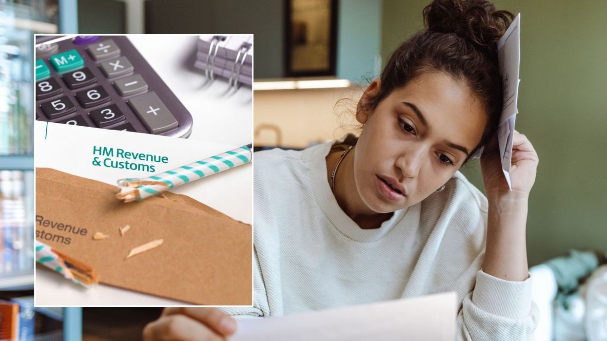 Woman looking at bill and HMRC letter