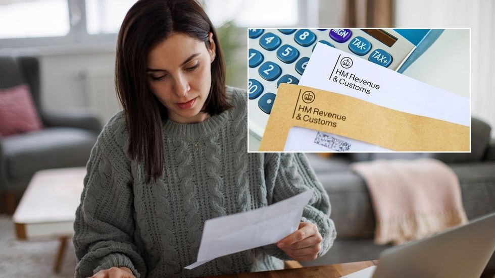 Woman looking at bill and HMRC letters