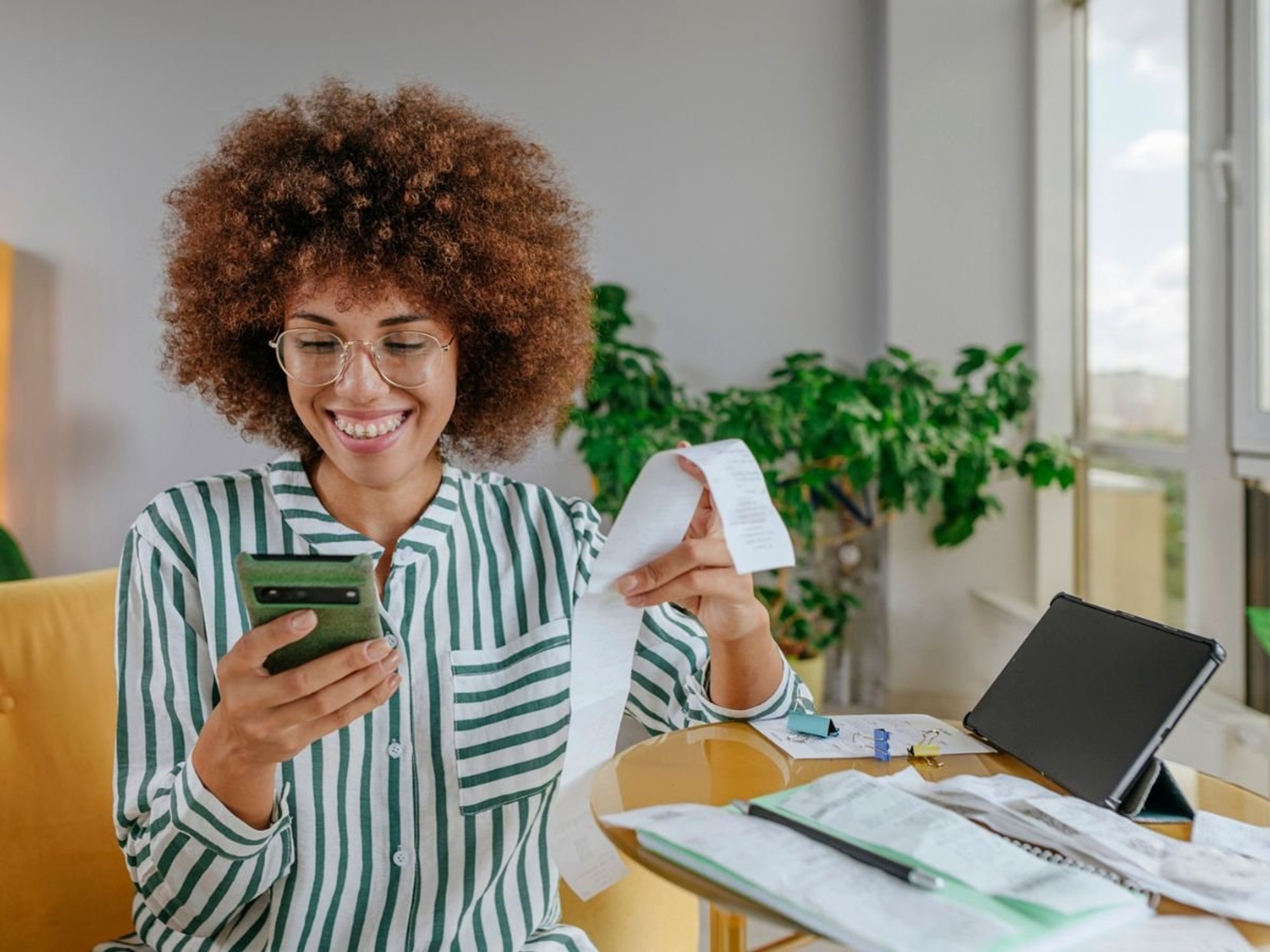 Woman looking at bill