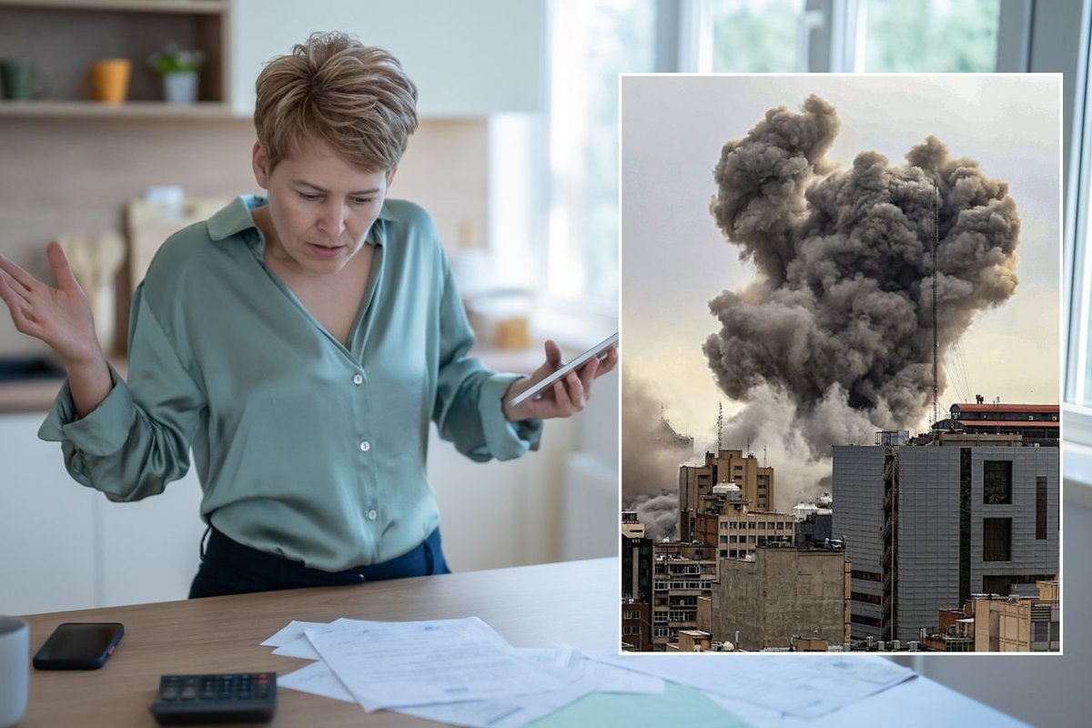 Woman looking at bills and explosion in Terhan, Iran
