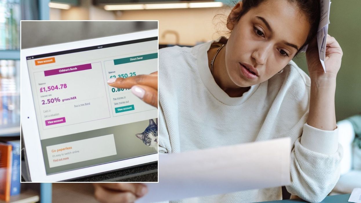 Woman looking at finances and tablet