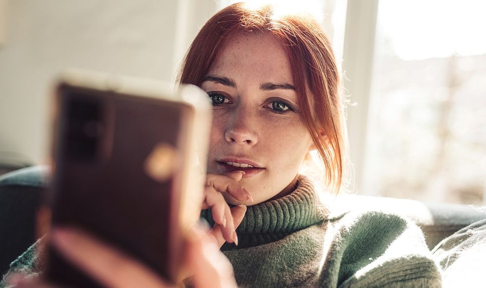 Woman looking at her phone