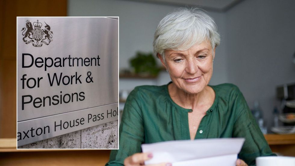 Woman looking at letter and DWP sign