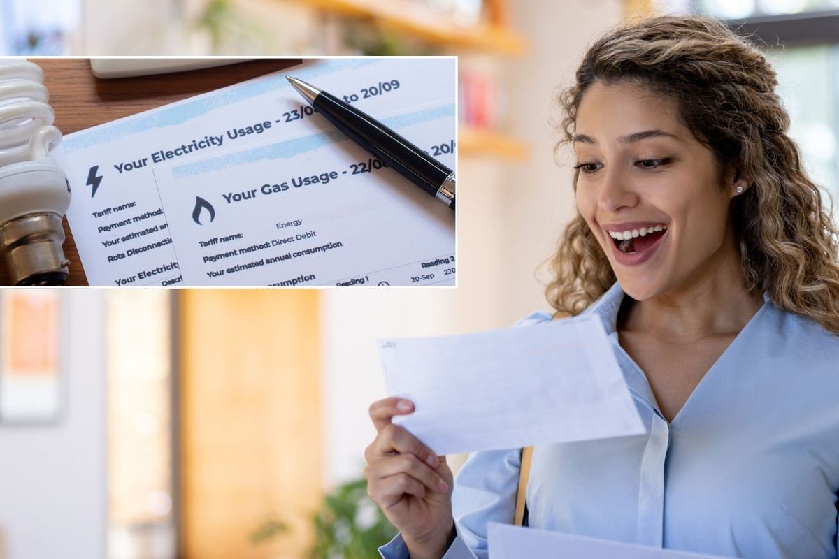 Woman looking at letter and energy bill