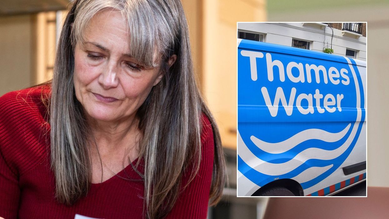 Woman looking at letter and Thames Water van