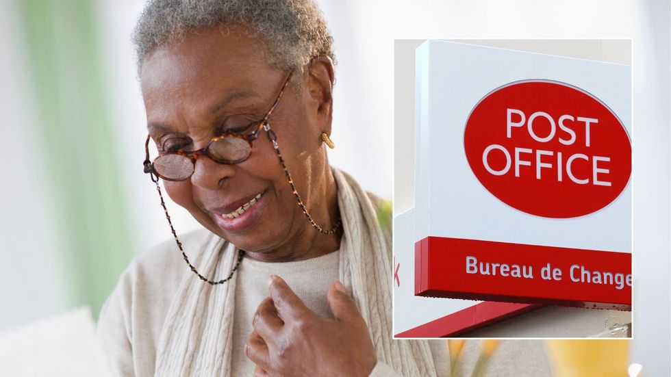 Woman looking at lettter and Post Office branch