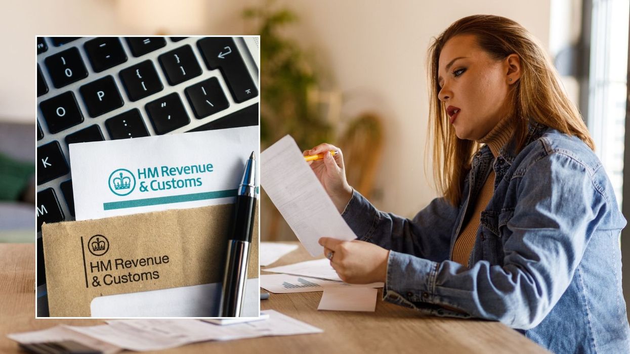 Woman looking at payslip and HMRC letter