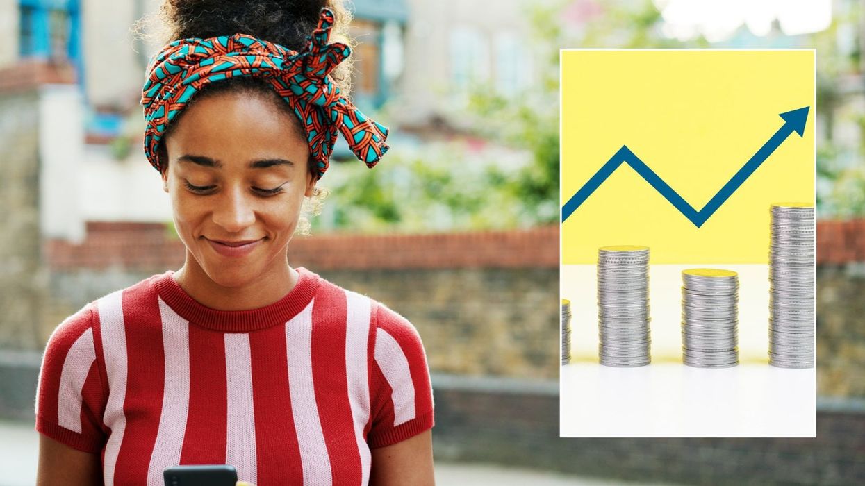 Woman looking at phone and interest rates rising