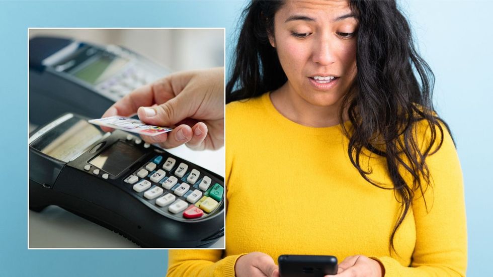 Woman looking at phone and person making contactless payment