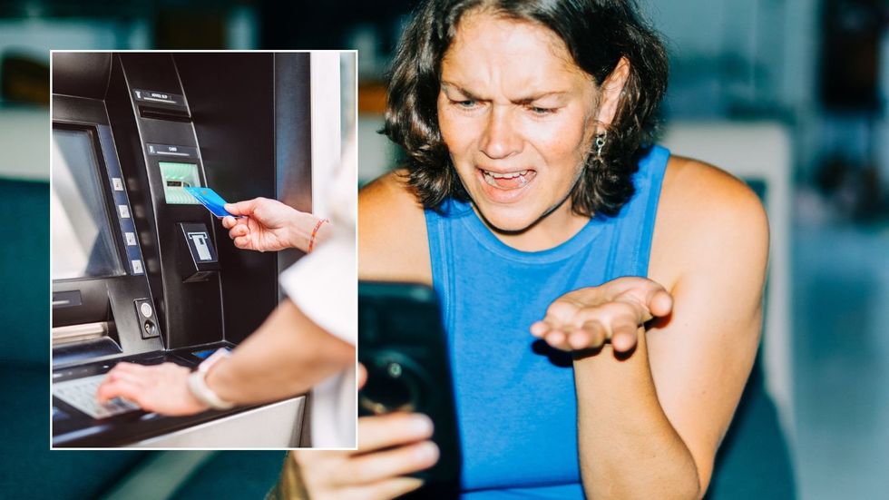Woman looking at phone and someone using bank card