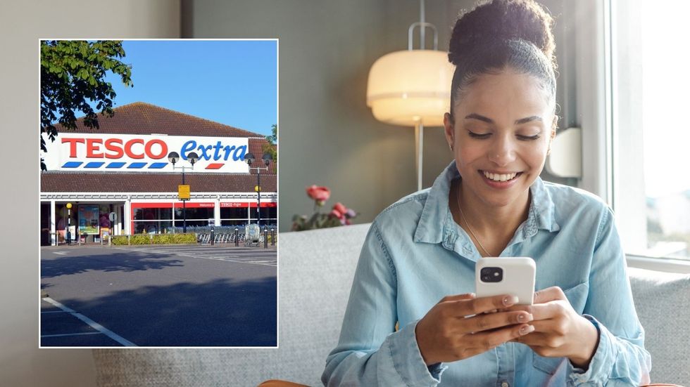 Woman looking at phone and Tesco