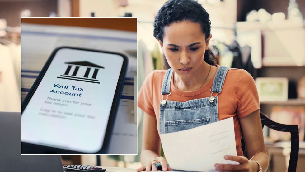 Woman looking at tax bill, tax account