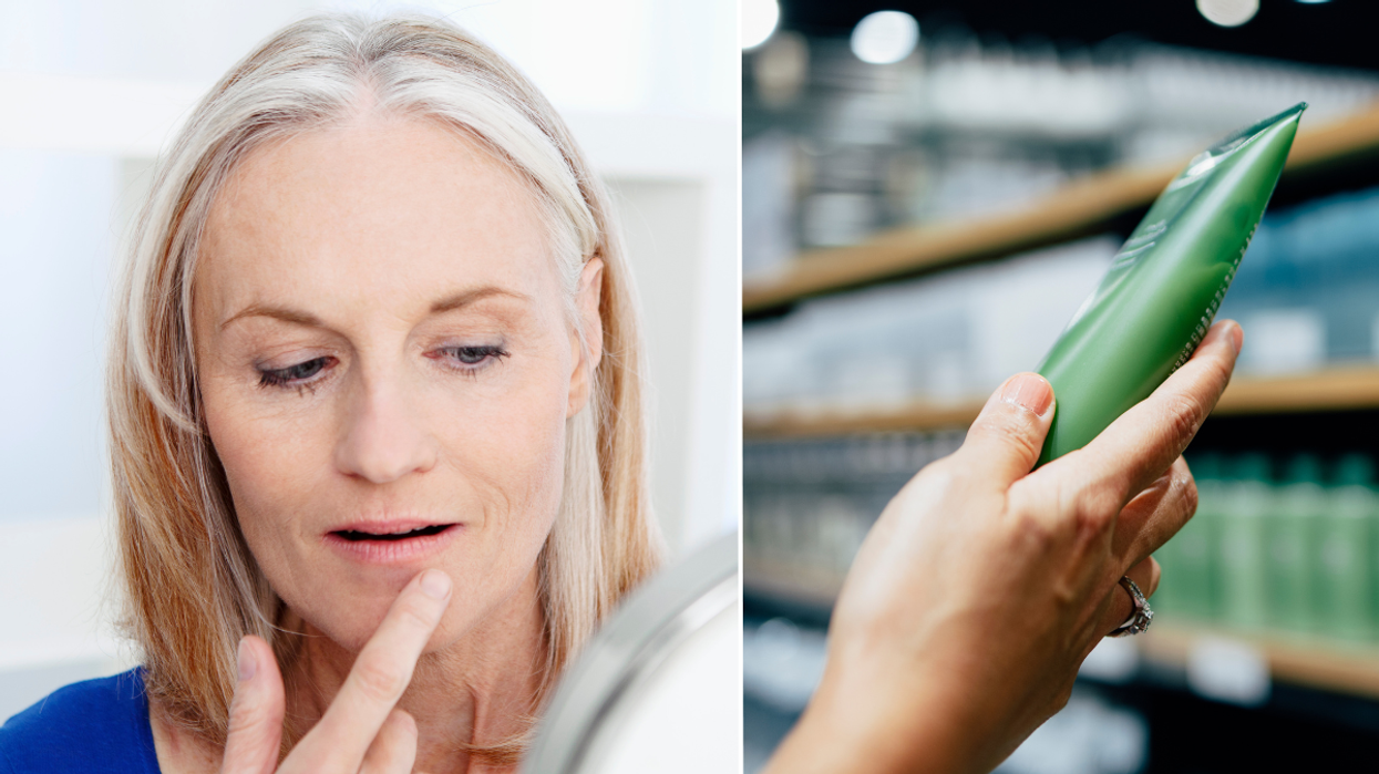 Woman looking in mirror / skin care products