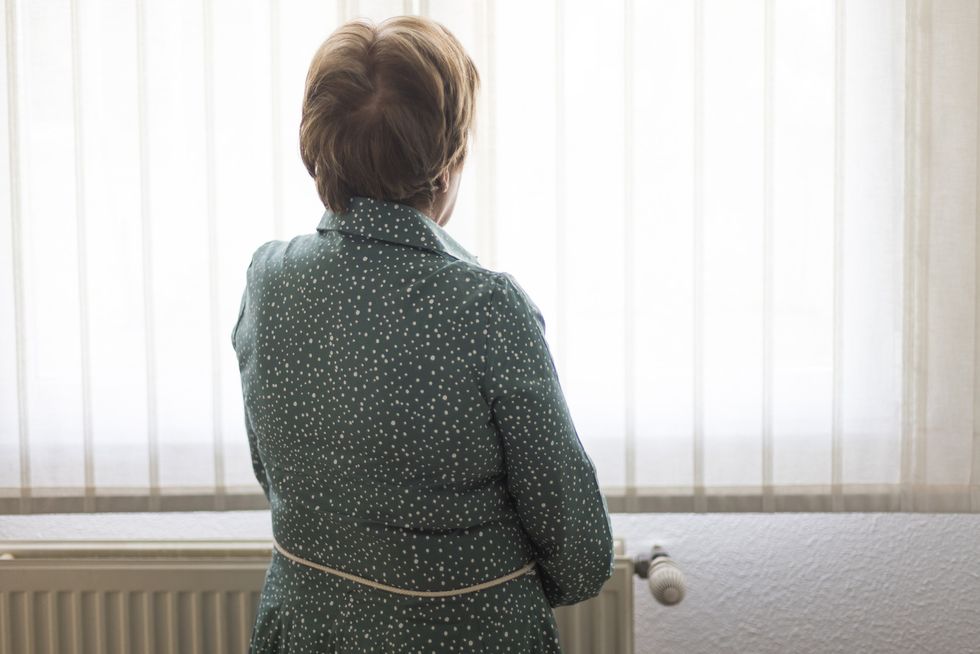 Woman looking out the window