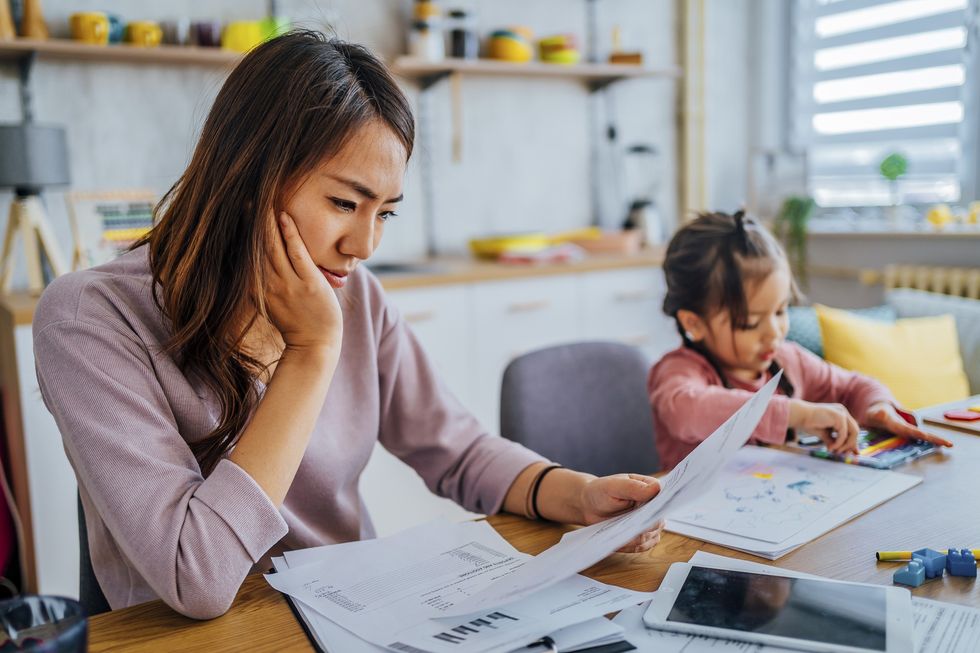 Woman looking over taxes