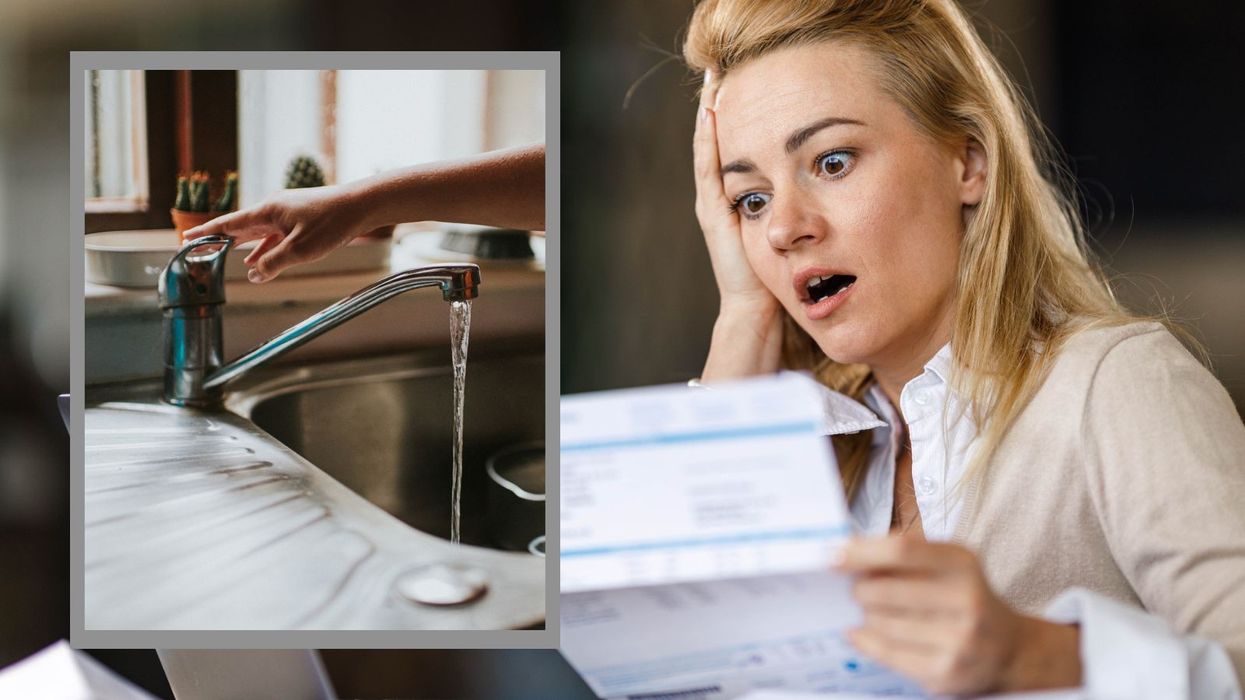 Woman looking shocked at bill and tap being turned on