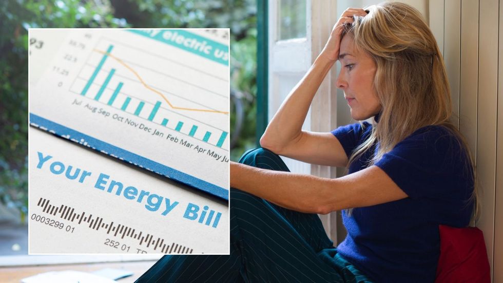 Woman looking stressed and energy bill