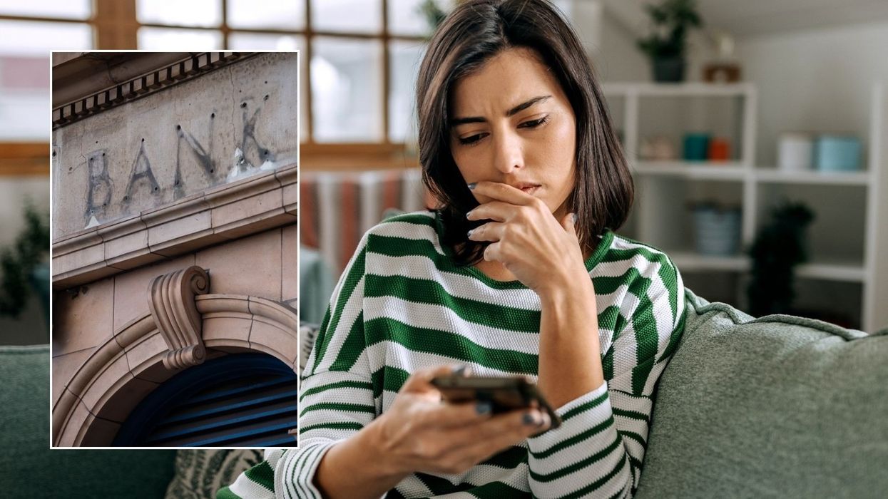 Woman looking worried and emty bank sign