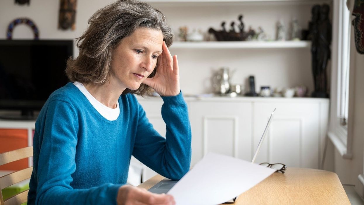 Woman looks worried about finances