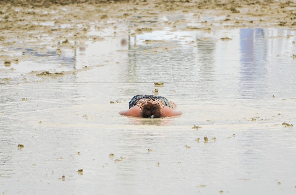 Woman lying in water