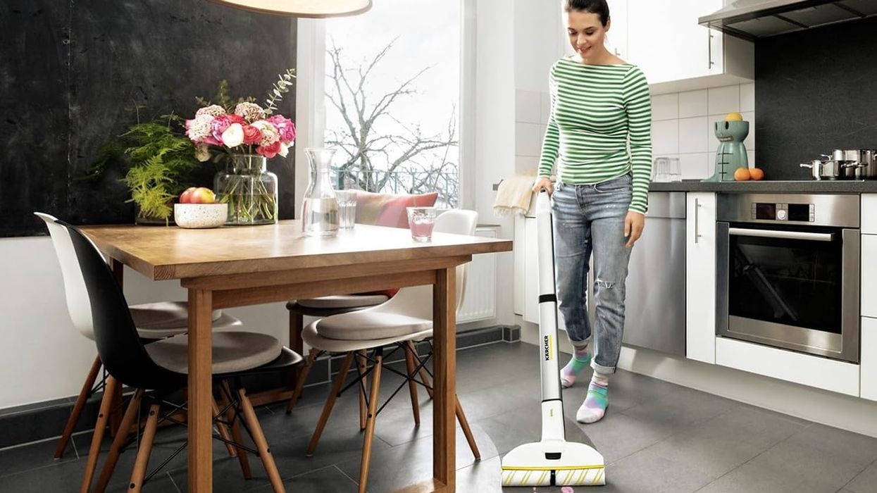 Woman mopping the floor
