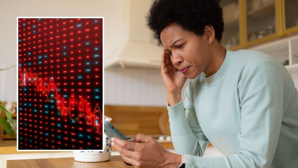 Woman on phone and interest rate graph going down